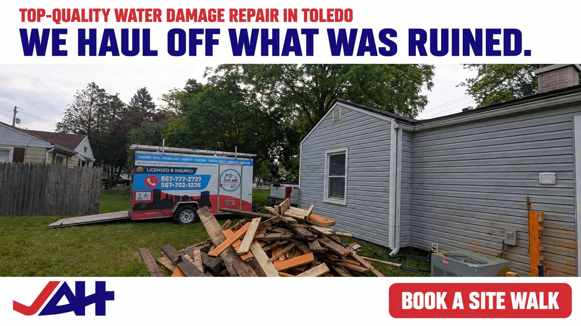 Water damage repair company truck removing debris from damaged house in Toledo