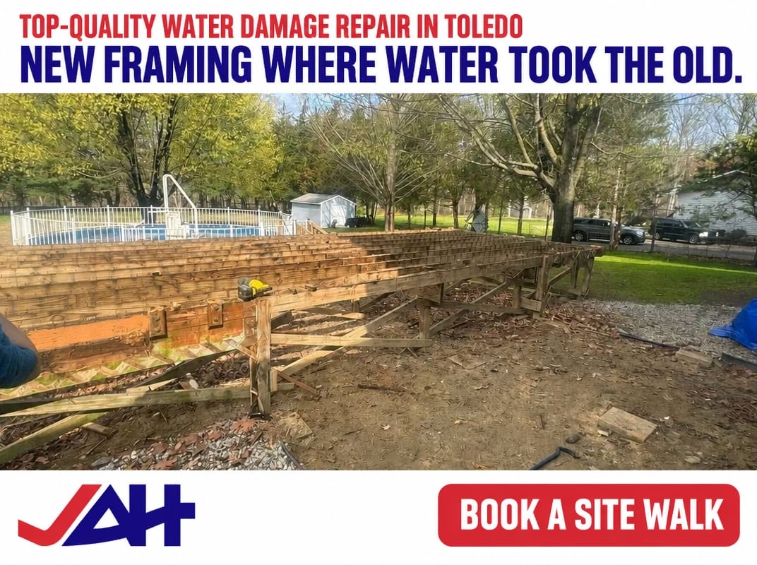 Water damage repair in Toledo showing new wooden framing installation in residential yard with trees and green lawn