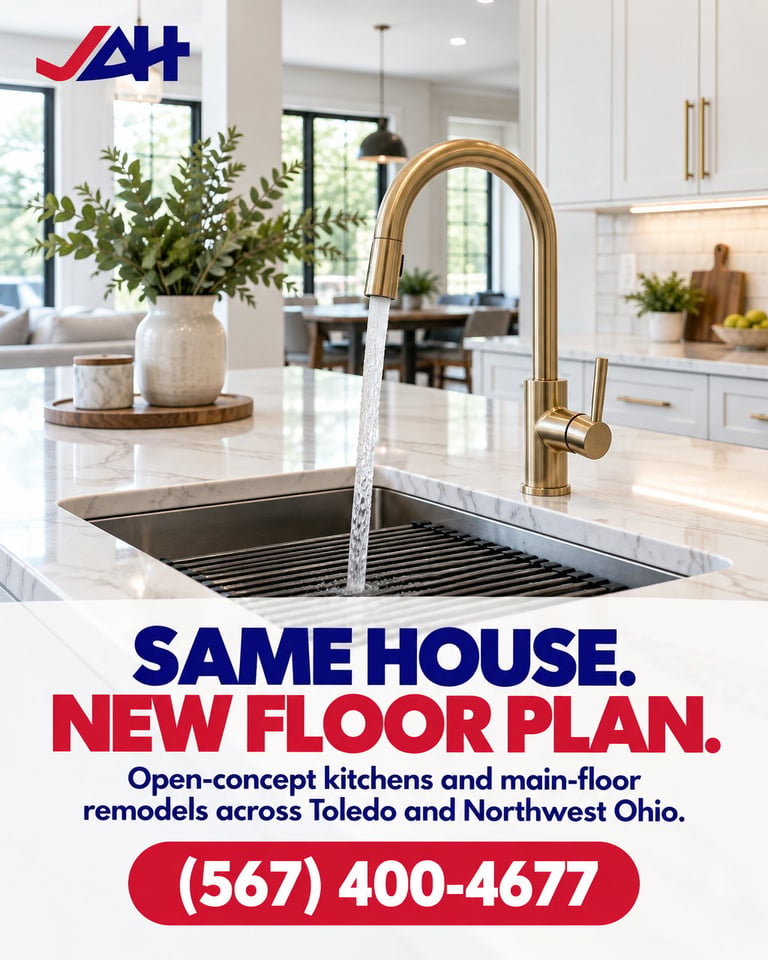 Modern kitchen with white cabinetry, marble countertop, and brass faucet with running water in sink. Home remodeling advertisement for open-concept kitchens in Toledo and Northwest Ohio. Phone number (567) 400-4677.