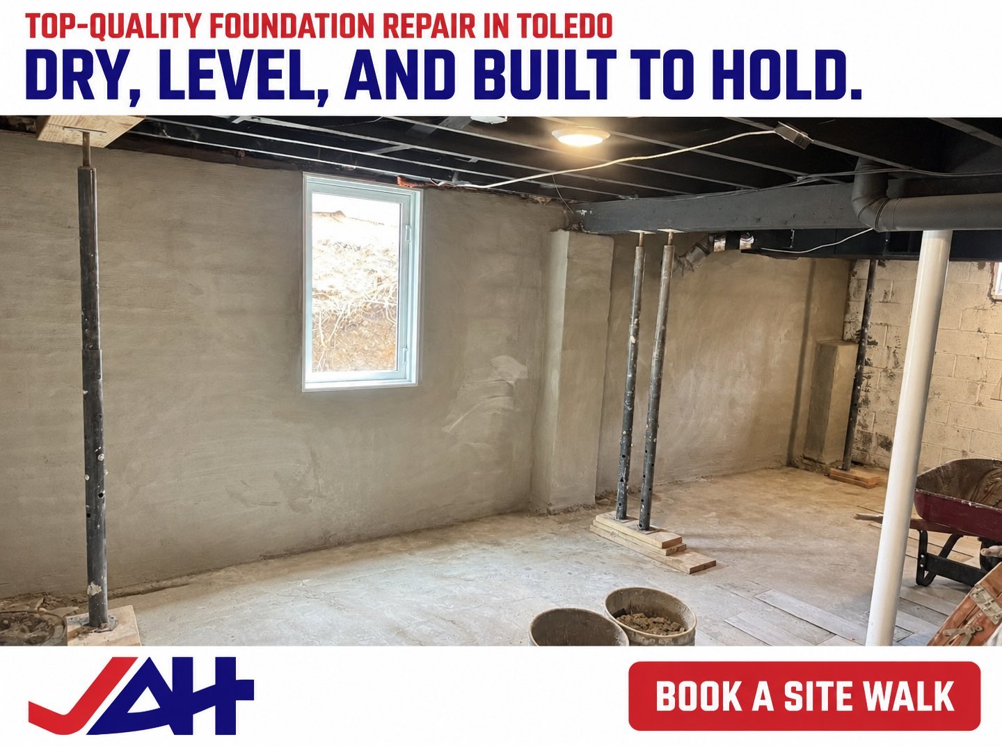Unfinished basement with concrete floor, support columns, and basement windows showing foundation repair work in Toledo