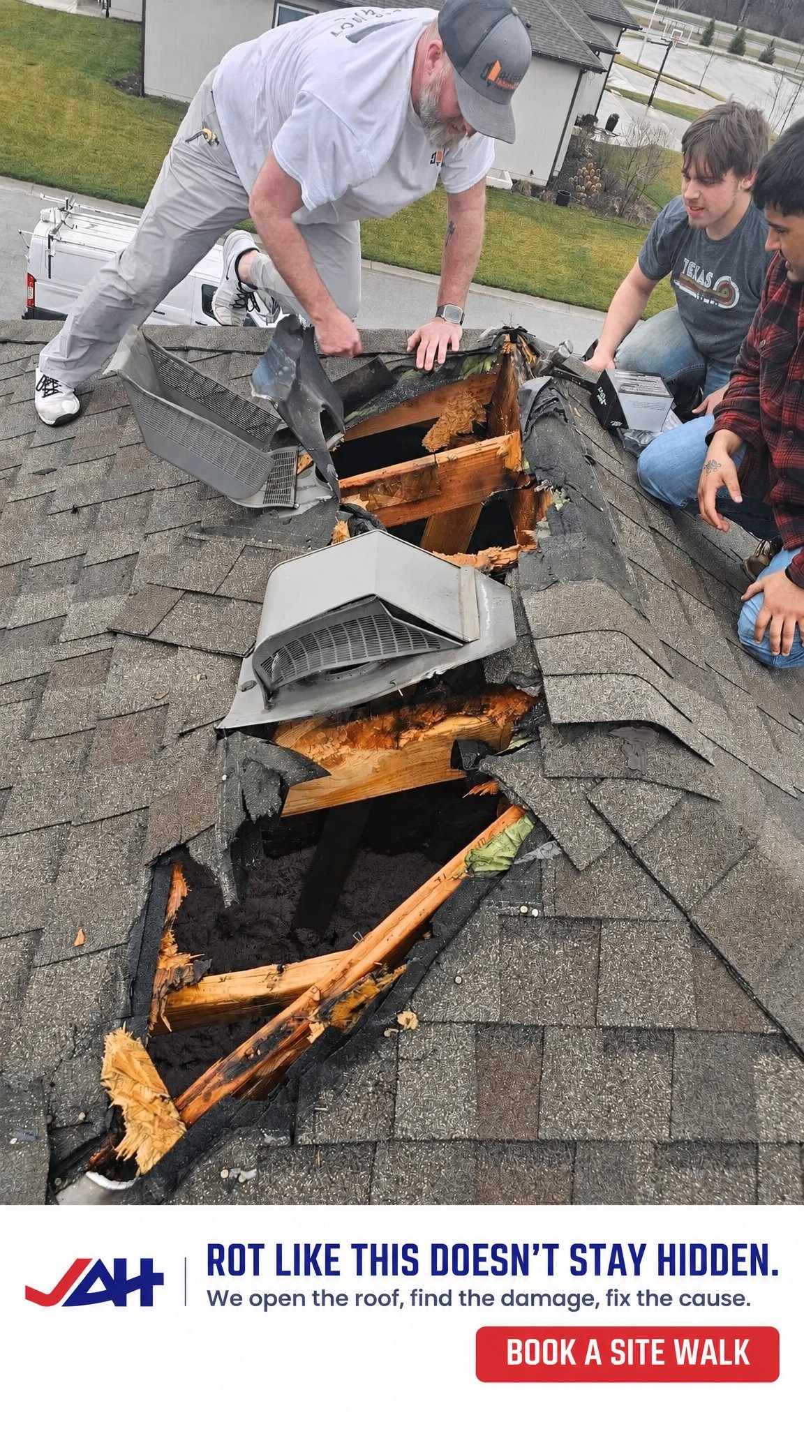 Roof inspector showing children extensive wood rot and damage inside an opened roof section during a home inspection